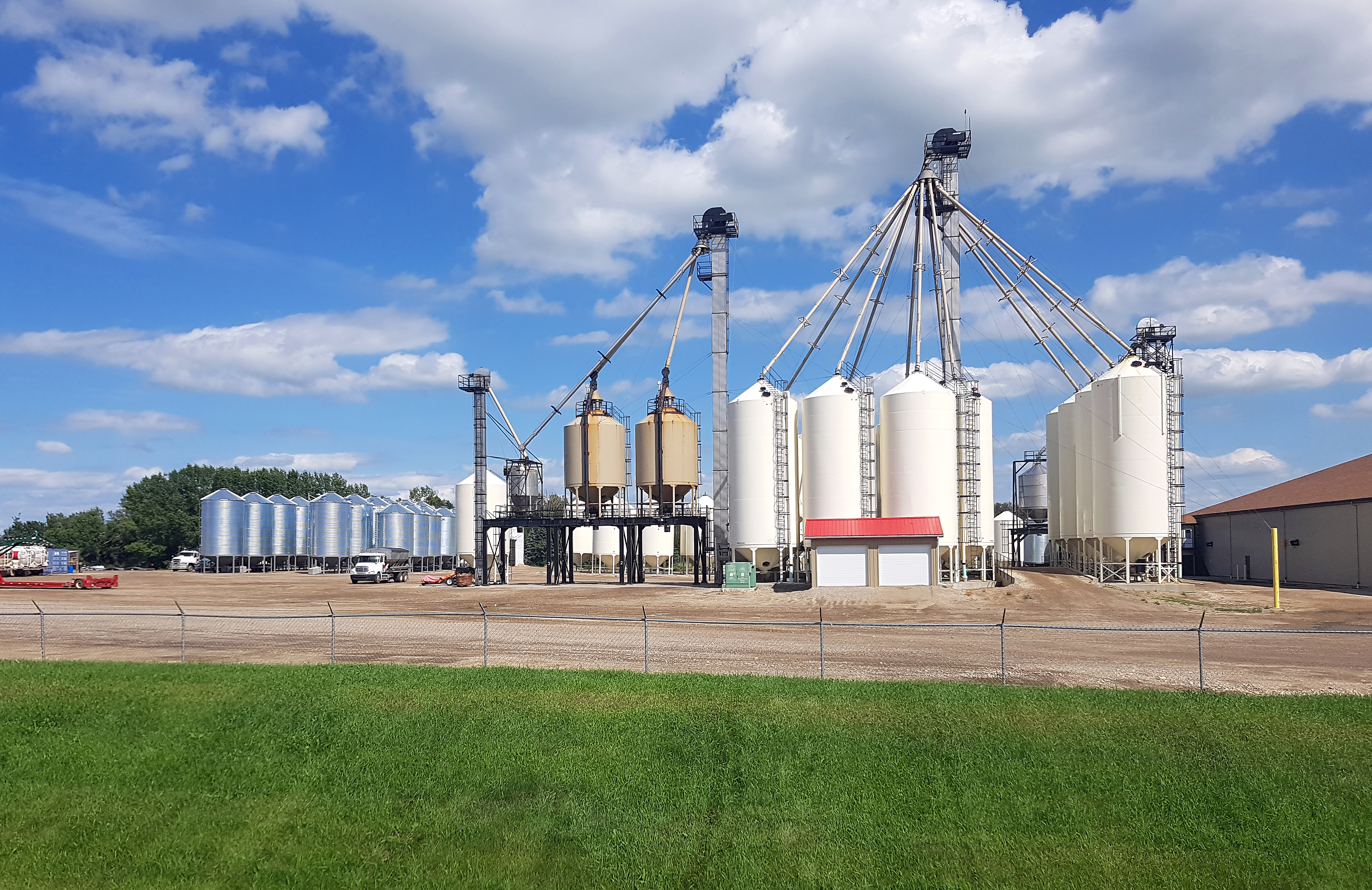 Agricultural silos at sunset